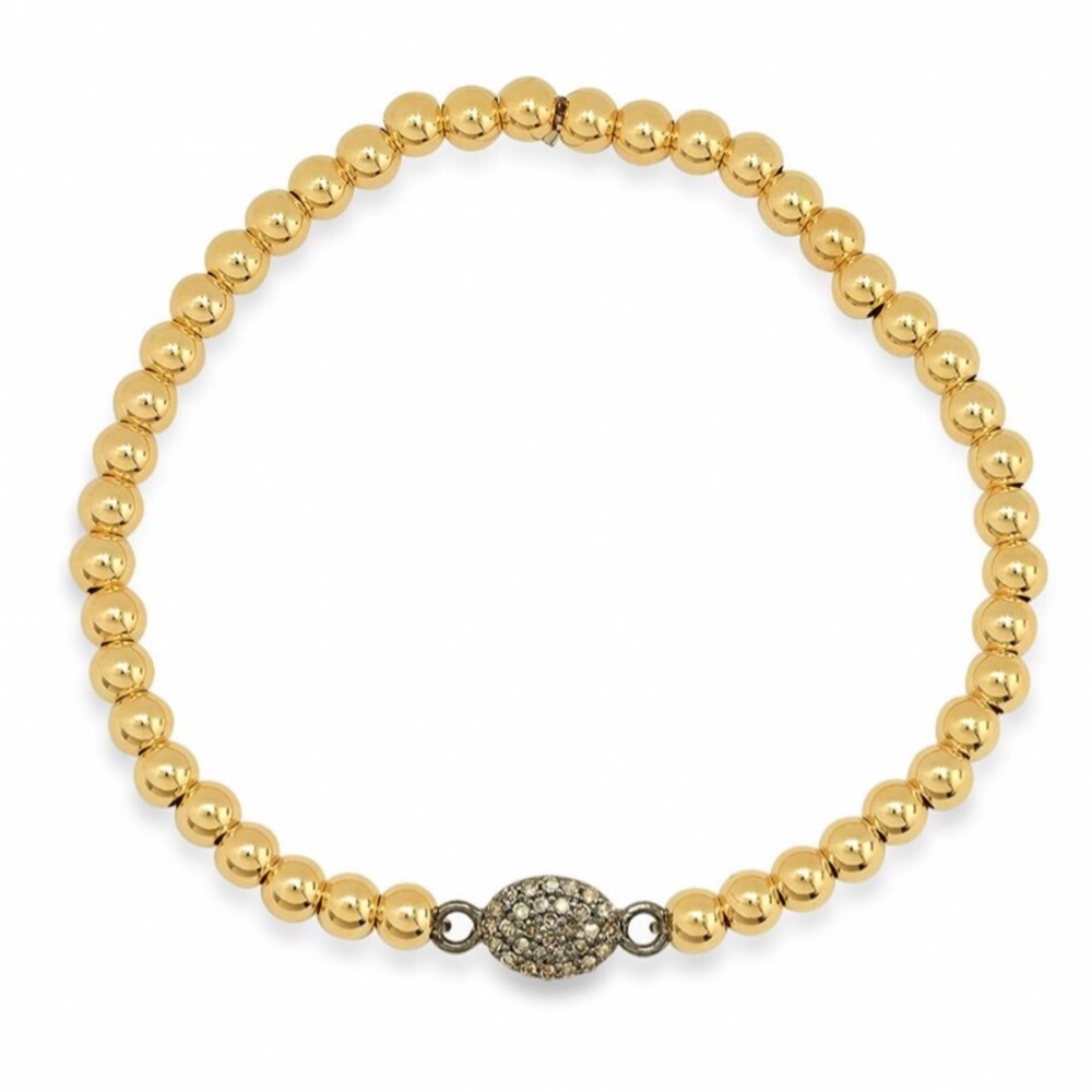 Gold beaded bracelet with pave diamond connector
